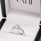 Emerald & Tapered Baguette Diamond Three Stone Ring in 18ct White Gold