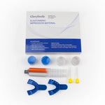GlorySmile elastomeric impression material kit with packaging, syringe, and impression trays on a white background.
