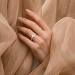 ARWEN seven stone marquise and round diamond ring in rose gold, on hand