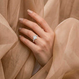 ARWEN seven stone marquise and round diamond ring in white gold, on hand