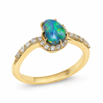 A yellow gold ring featuring a large oval opal center stone with vibrant blue, green, and orange play-of-color, accented by small clear pavé diamonds along a split shank, set against a plain white background.
