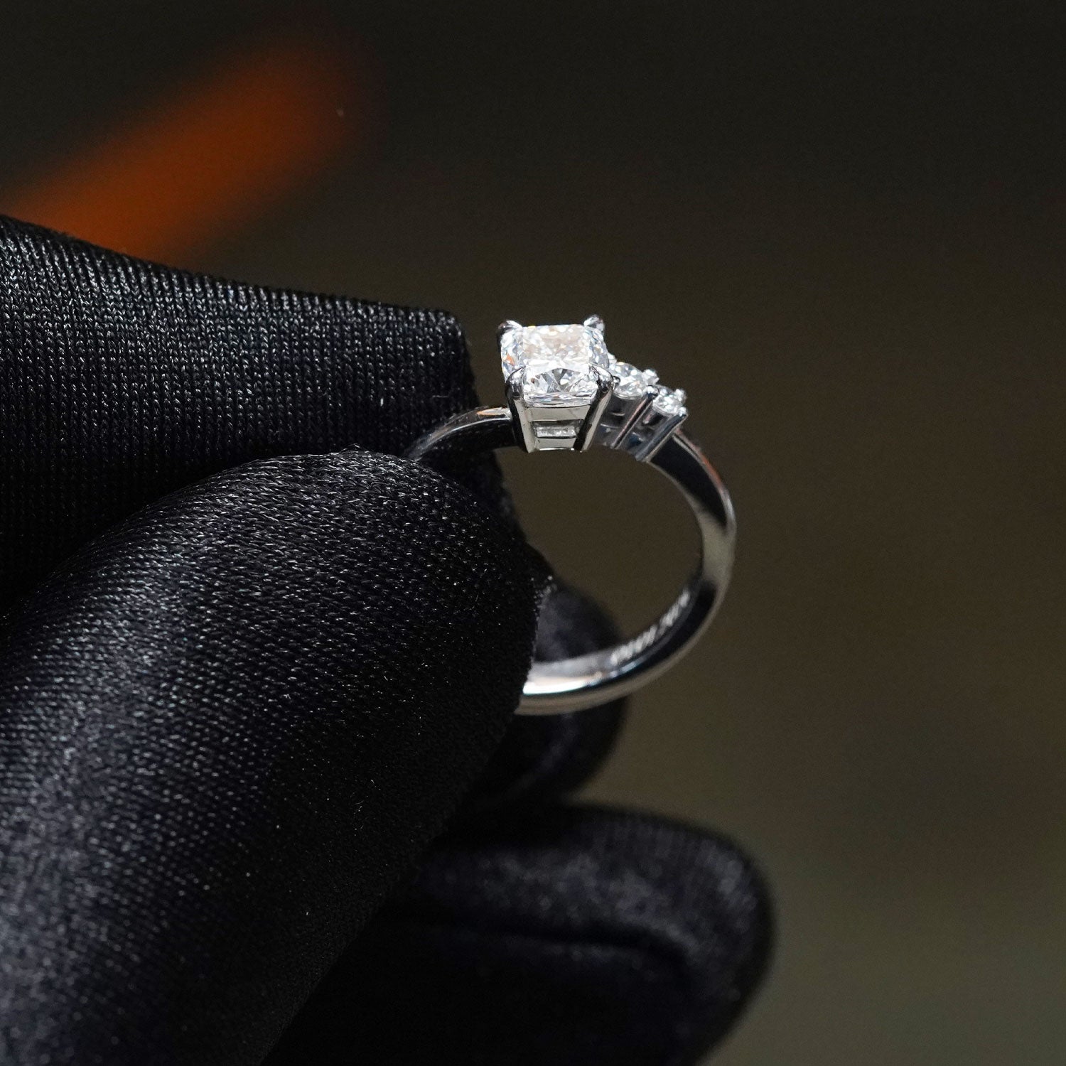 CUSTOM | Cushion Cut & Two Side Stones in 18ct White Gold – side view