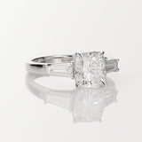 Cushion and Tapered Baguette Three Stone Ring in 18ct White Gold