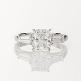 Cushion and Tapered Baguette Three Stone Ring in 18ct White Gold