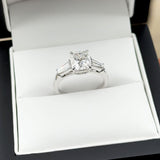 Cushion and Tapered Baguette Three Stone Ring in 18ct White Gold