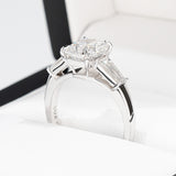 Cushion and Tapered Baguette Three Stone Ring in 18ct White Gold
