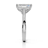 A radiant cut diamond engagement ring in a polished silver-colored metal setting, shown from a front-facing perspective on a clean white background.