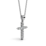 ELENA round brilliant diamond cross pendant in white gold, 0.20ct total weight, side view showing shared prong setting and bail