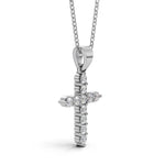 ELENA round brilliant diamond cross pendant in white gold, 0.40ct total weight, side view showing shared prong setting and bail