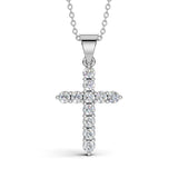 ELENA round brilliant diamond cross pendant in white gold, 0.60ct total weight, shared prong setting, front view