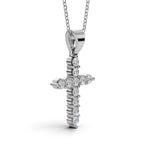 ELENA round brilliant diamond cross pendant in white gold, 0.60ct total weight, side view showing shared prong setting and bail