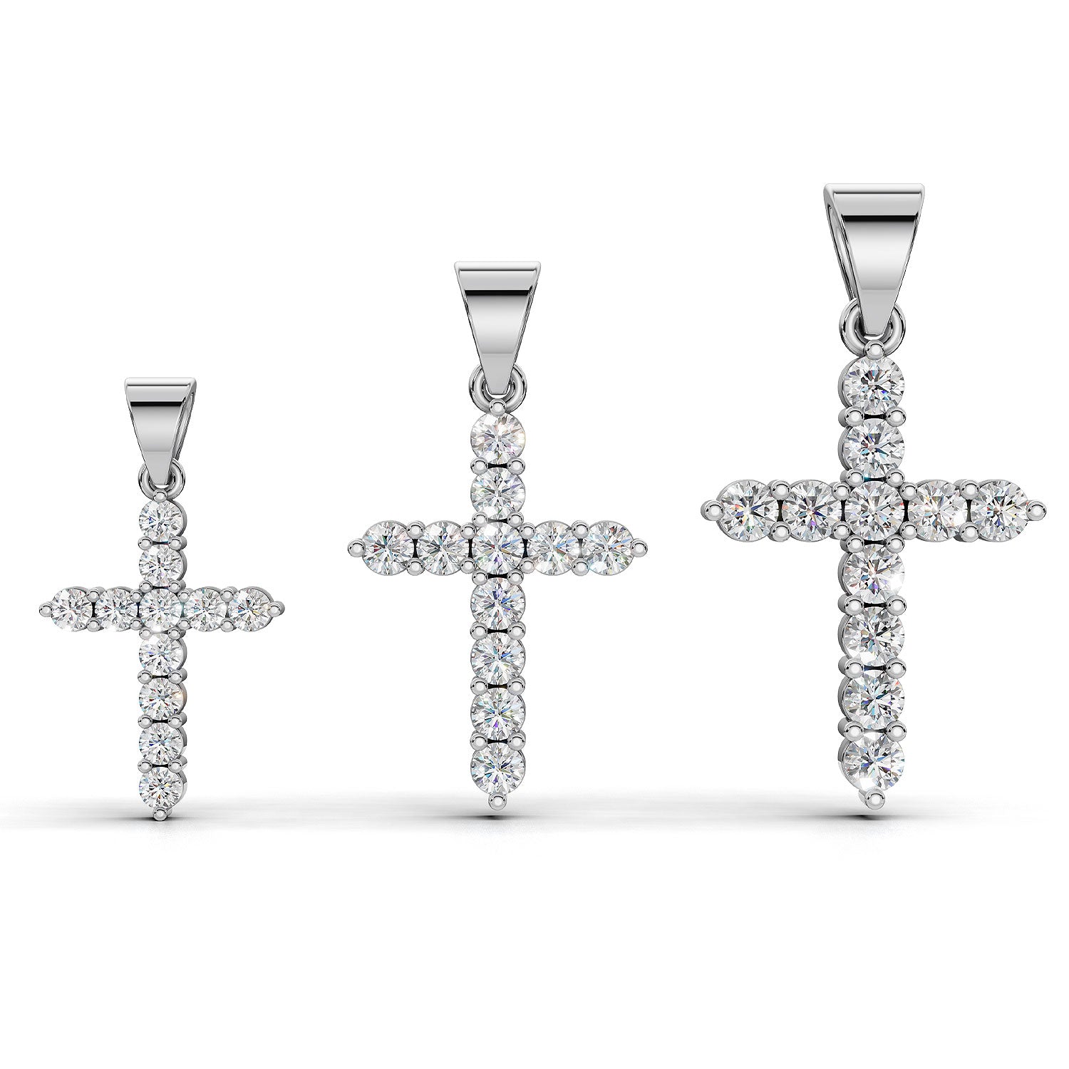 ELENA round brilliant diamond cross pendants in white gold, all three sizes together: 0.20ct, 0.40ct and 0.60ct total weight