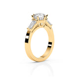 EMMA | Round Brilliant & Tapered Baguette Diamond Ring in Yellow Gold