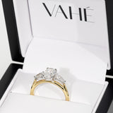 Gold ring with three diamonds in a Vahé box