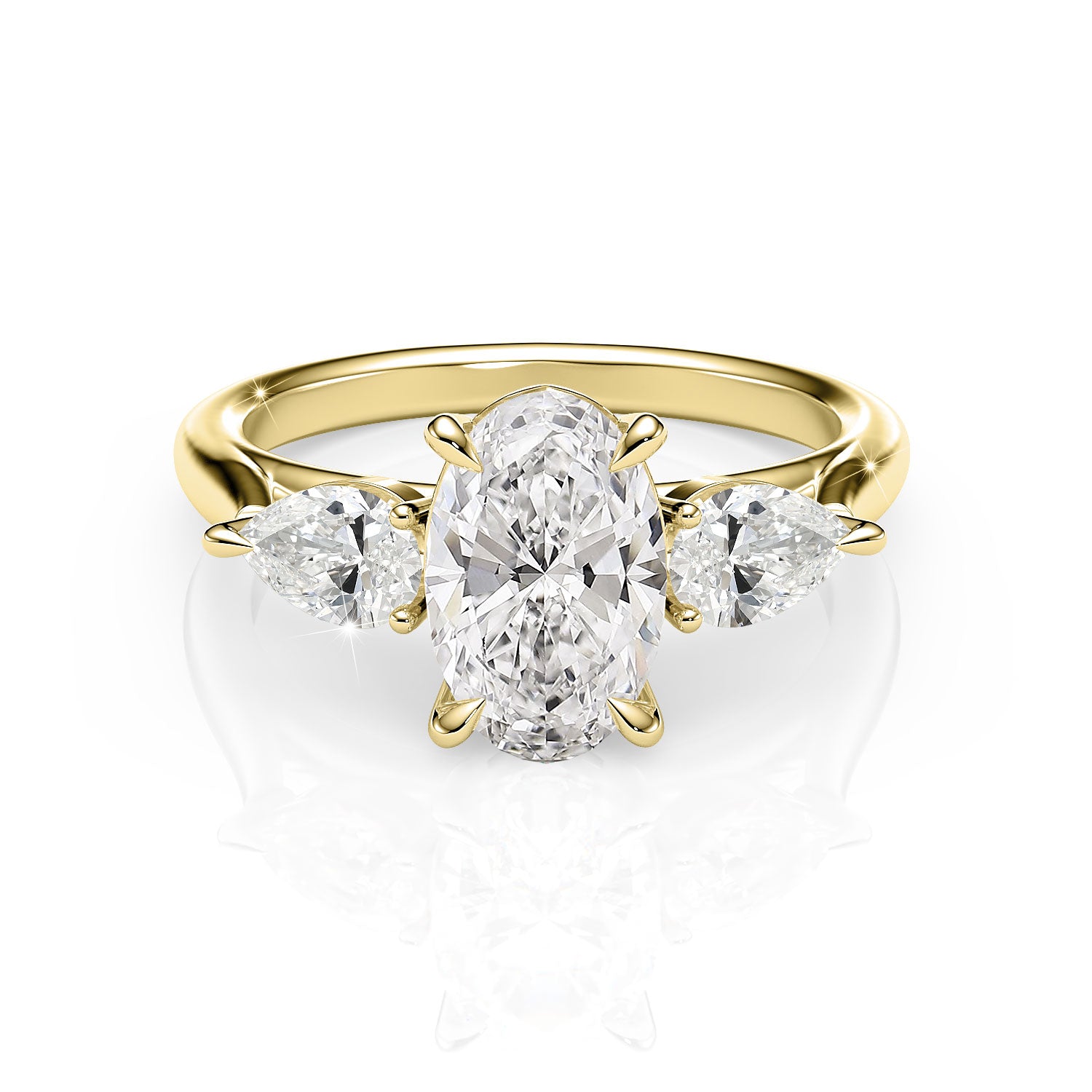 Gold ring with a central diamond and two smaller diamonds on a white background