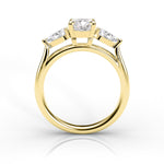 Gold ring with a diamond on a white background