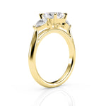 Gold ring with three diamonds on a white background