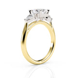 Gold ring with a large diamond on a white background