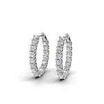 ILAYDA claw set diamond huggie earrings in white gold, 0.90ct total weight, side view