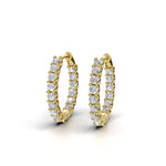 ILAYDA claw set diamond huggie earrings in yellow gold, 0.90ct total weight, side view