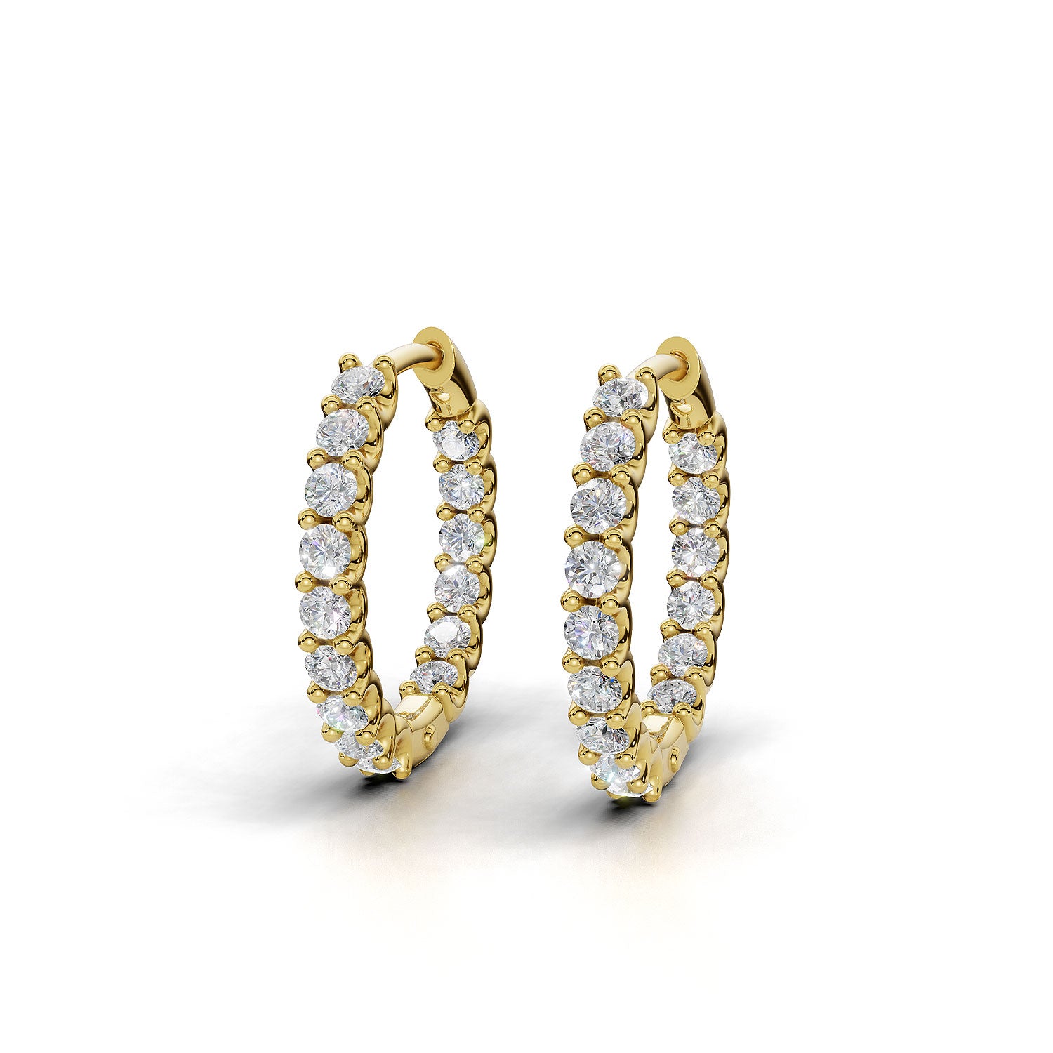 ILAYDA claw set diamond huggie earrings in yellow gold, 0.90ct total weight, side view
