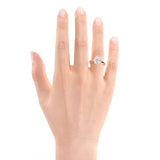 ABI | Sechs-Krappen-Solitärring mit rundem Brillantdiamant in 18 Karat Weißgold