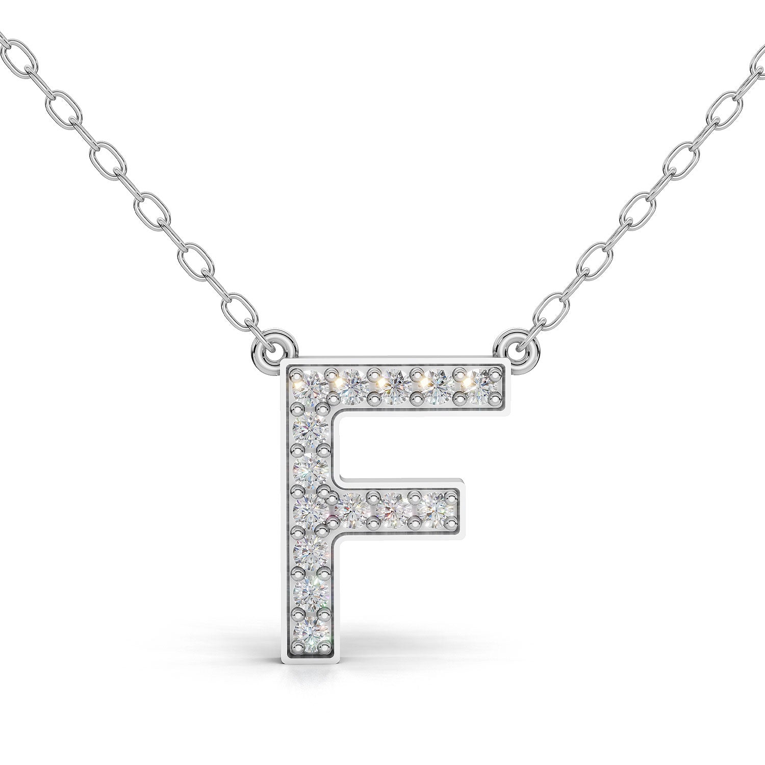 MELEK diamond initial pendant, letter F, in white gold with pavé diamonds