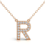 MELEK diamond initial pendant, letter R, in rose gold with pavé diamonds
