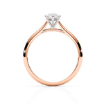 Rose gold ring with a diamond on a white background
