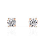 Rose gold stud earrings with clear gemstones on a white background