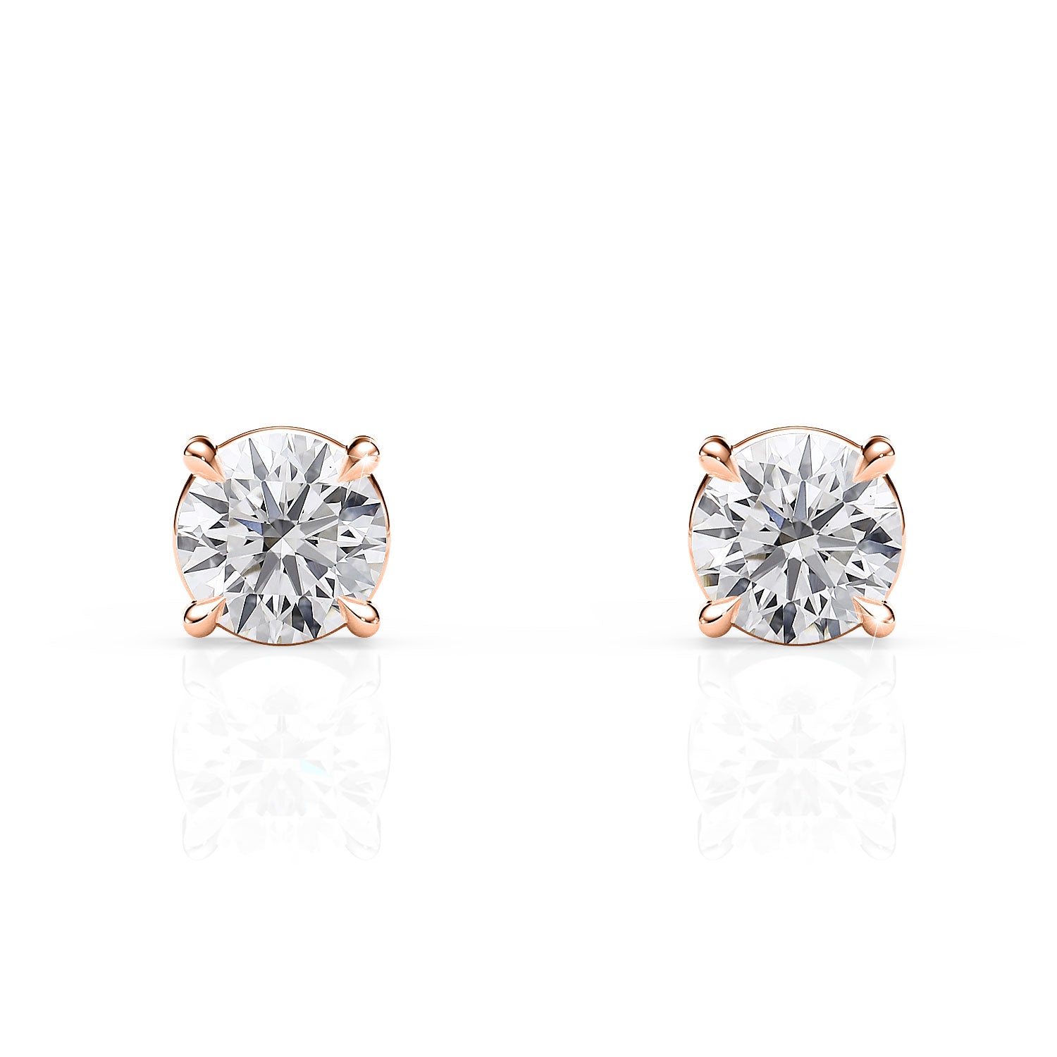 Rose gold stud earrings with clear gemstones on a white background