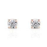 Rose gold stud earrings with clear gemstones on a white background