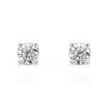 Pair of diamond stud earrings on a white background