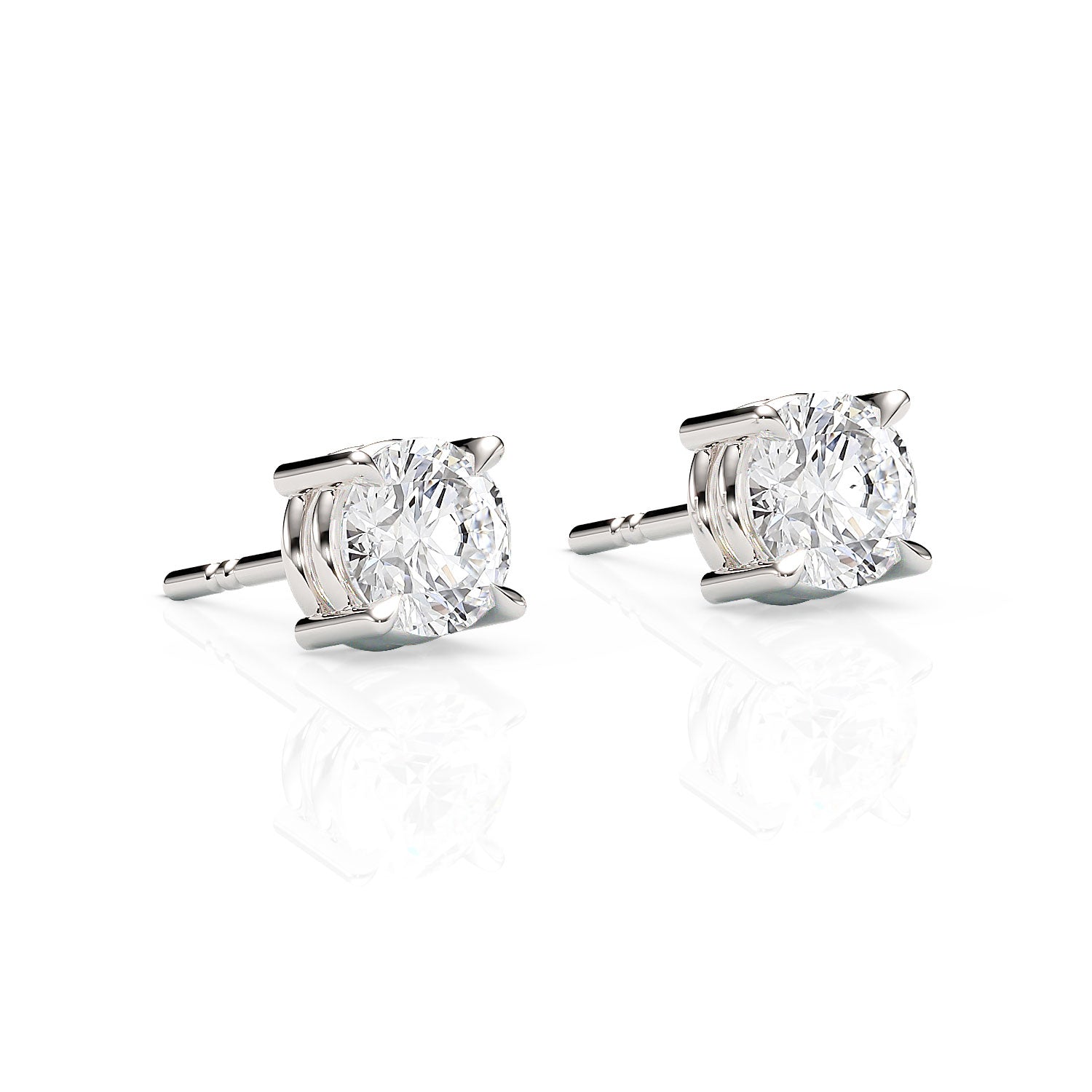 Pair of diamond stud earrings on a white background