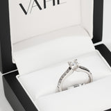 Princess Cut Solitaire with Channel Set Shoulders in 18ct White Gold