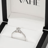 Round Brilliant Solitaire with Swept Up Shoulders in 18ct White Gold