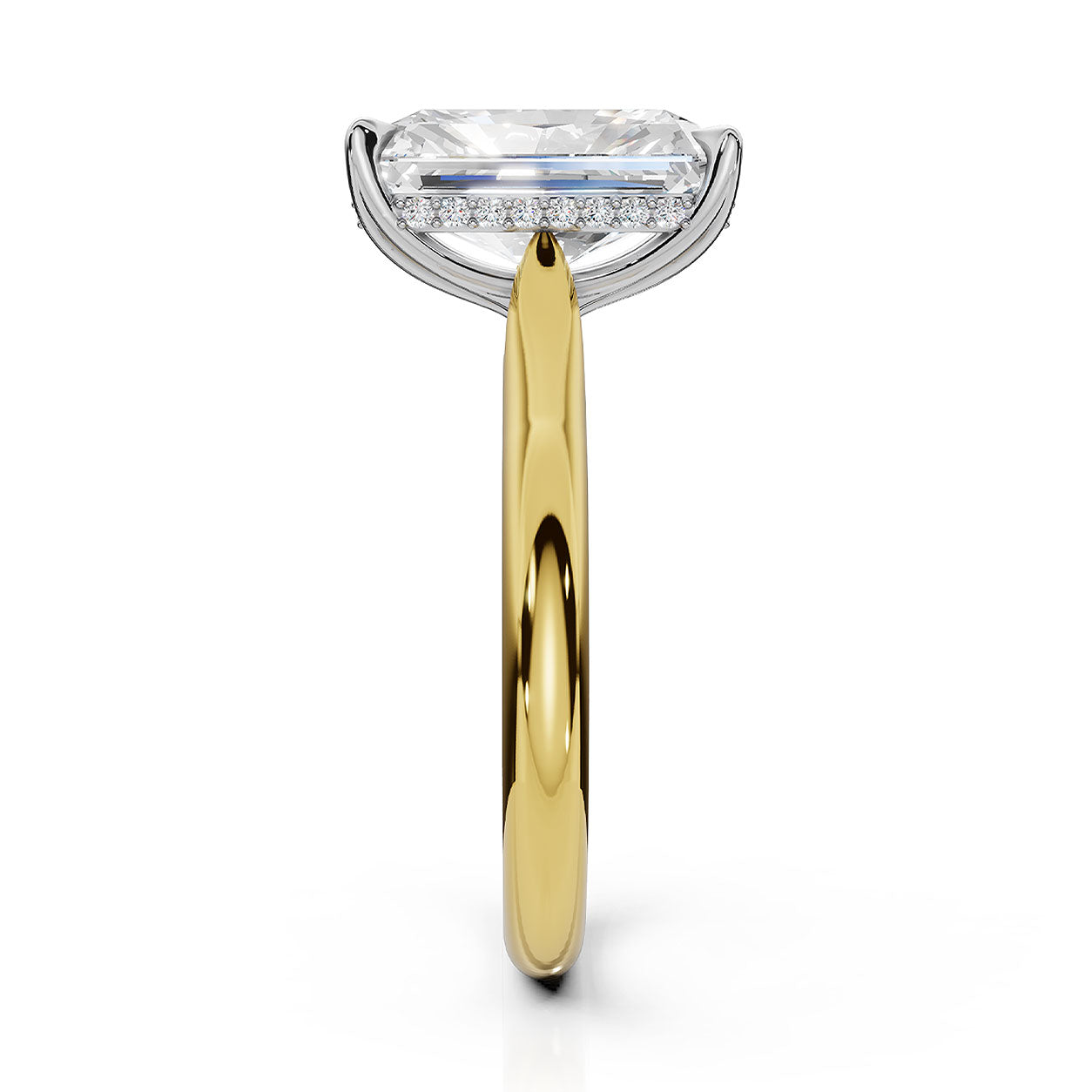 An engagement ring featuring a large rectangular emerald-cut diamond set in a silver-colored halo with a yellow gold band, shown on a clean white background.