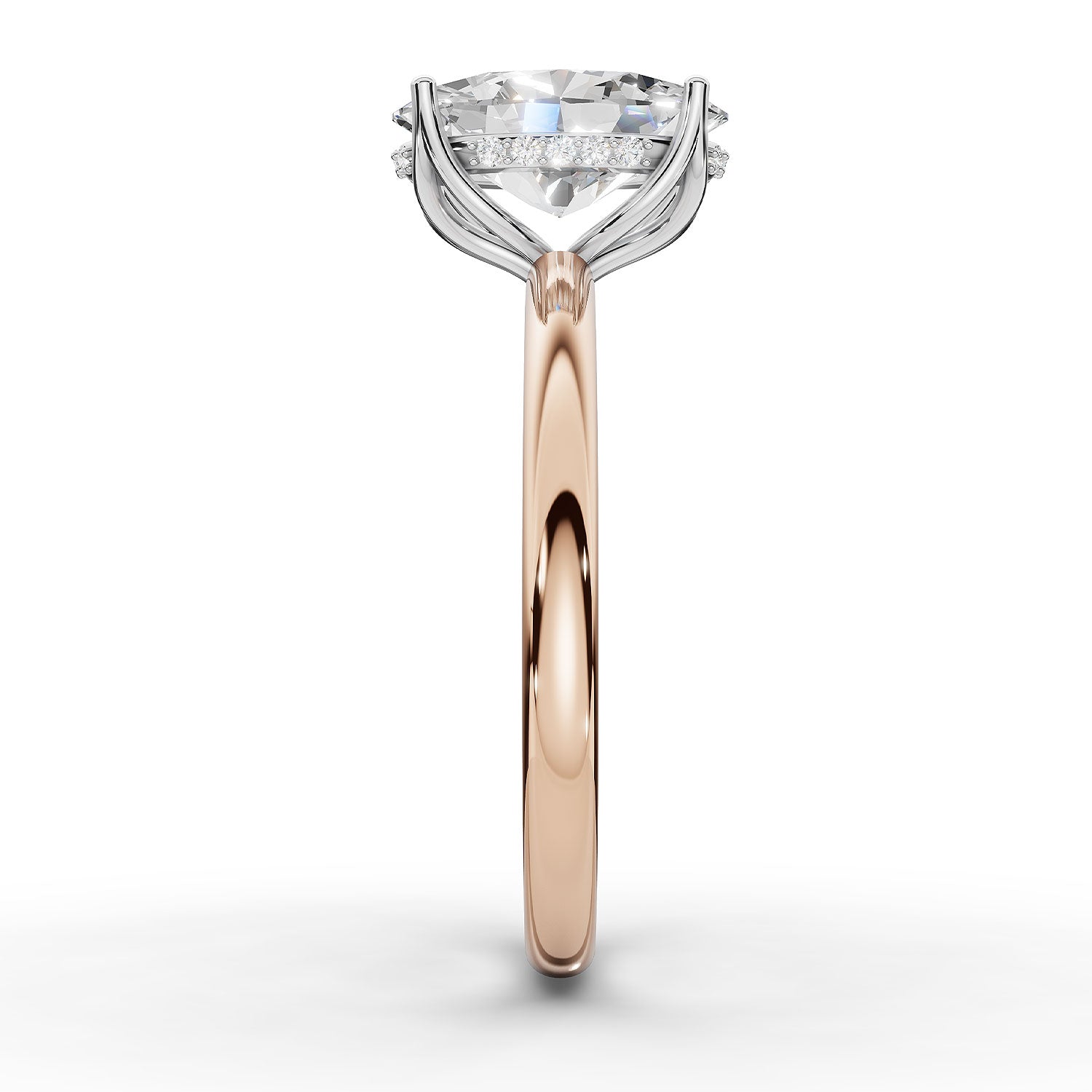 A rose gold engagement ring featuring a large round-cut diamond center stone in a four-prong setting, accented by small diamonds along the shoulders, shown on a clean white background.