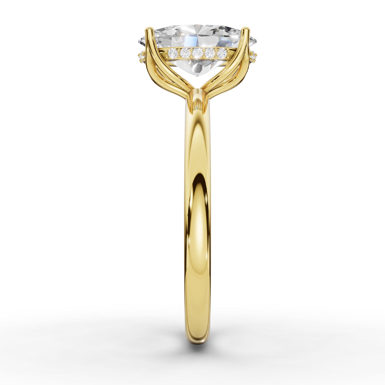 A yellow gold solitaire engagement ring featuring a large oval-cut clear gemstone accented by a row of small round diamonds along the band, set against a clean white background.