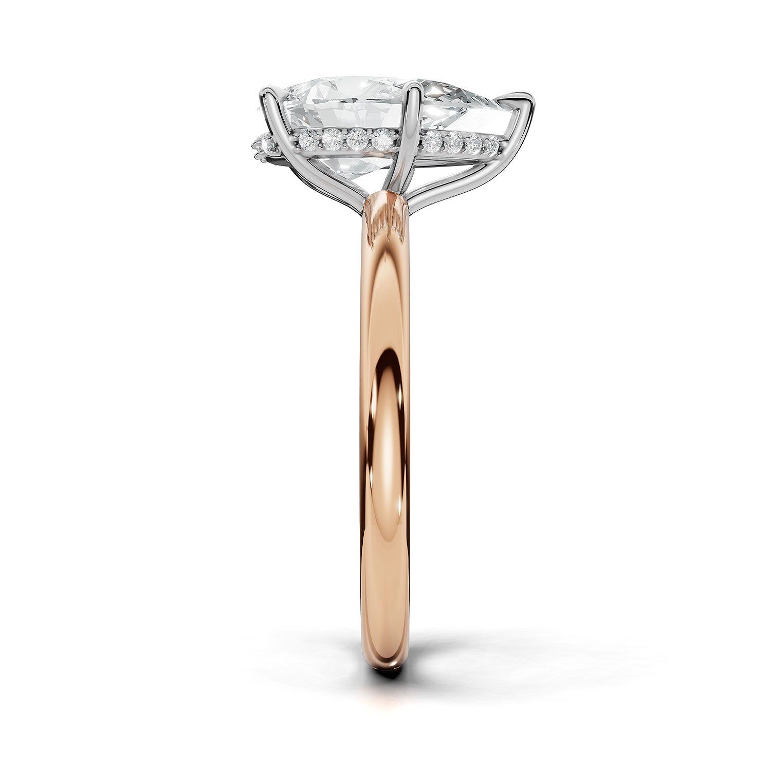 A rose gold engagement ring featuring a large pear-cut center diamond surrounded by a halo of small clear stones, set on a polished rose gold band against a white background.