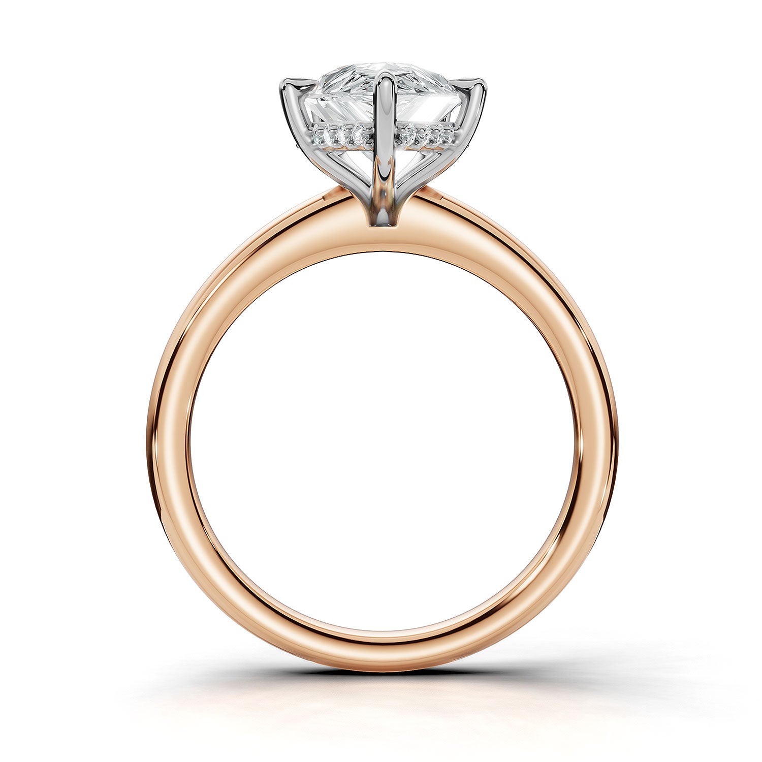 A rose gold diamond ring with a brilliant round-cut center stone and small side stones in a silver-colored setting, shown on a clean white background.