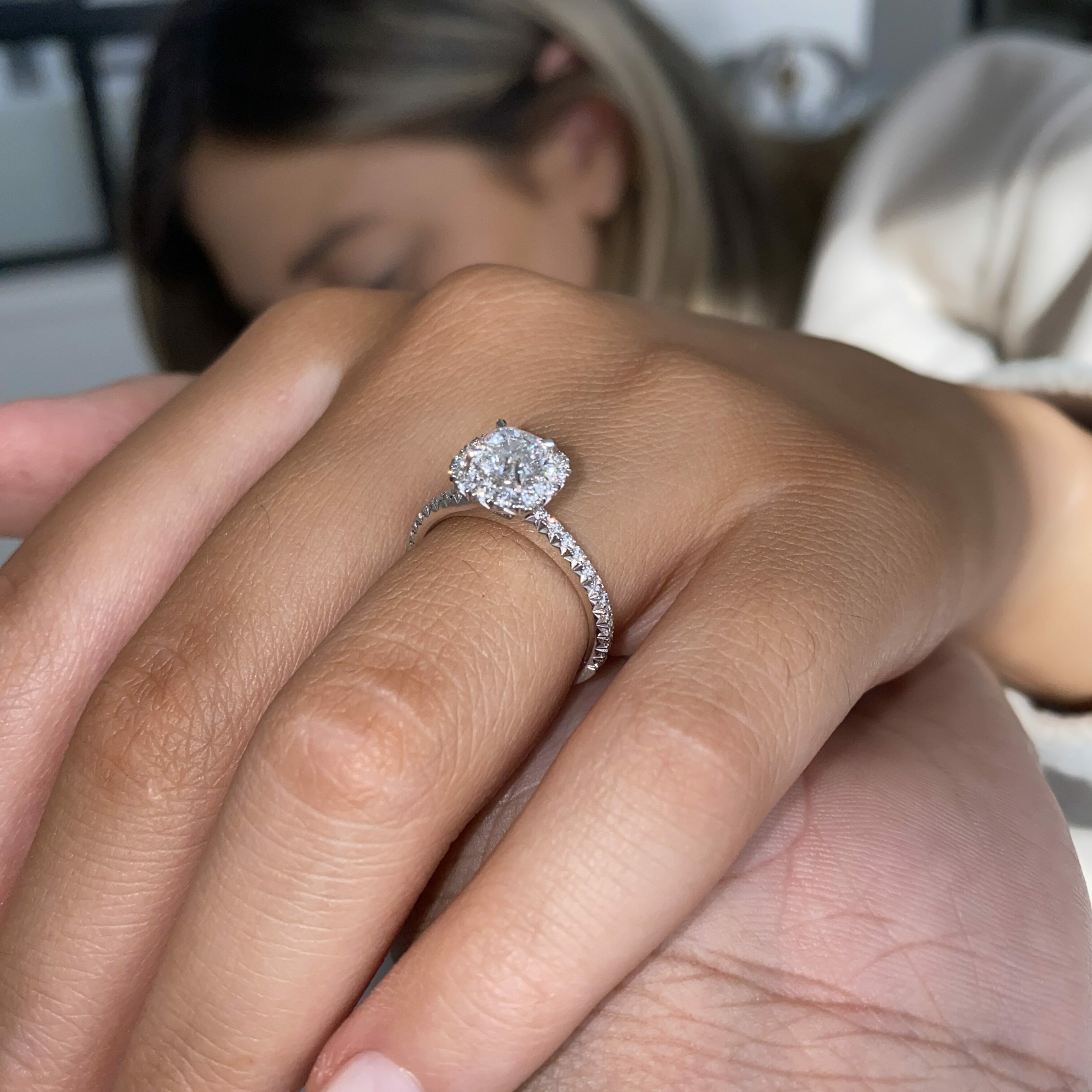 Cushion pave clearance engagement ring